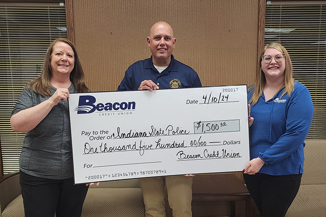 Check presentation for  Beacon Credit Union donates $1500 to Indiana State Police Alliance