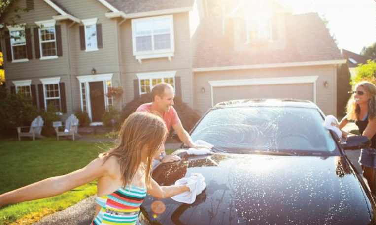 Family washing car