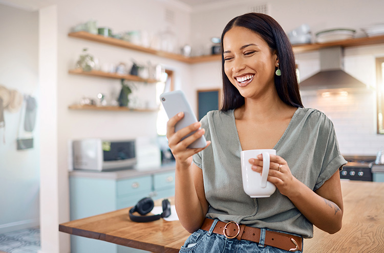 Phone of woman using phone for TransferNow